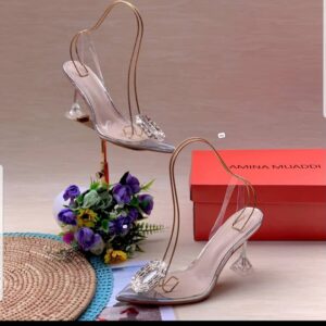 WhatsApp Image 2025-10-19 at 17.04.05_d7dd99f6 AMINA MUADDI CLEAR PVC SCULPTURAL HEEL SANDALS
