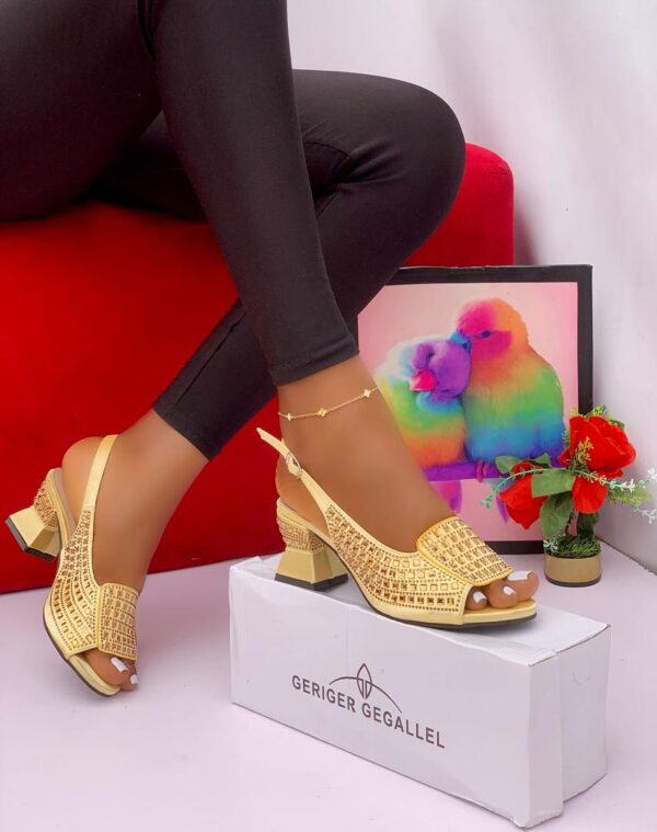 WEDGE HEELED SANDALS